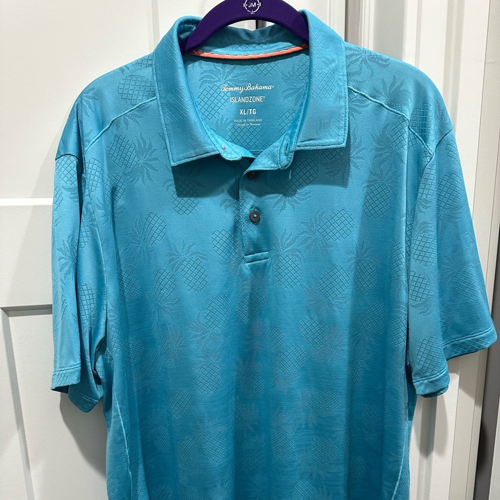 Tommy Bahama polo size XL. Rarely worn.